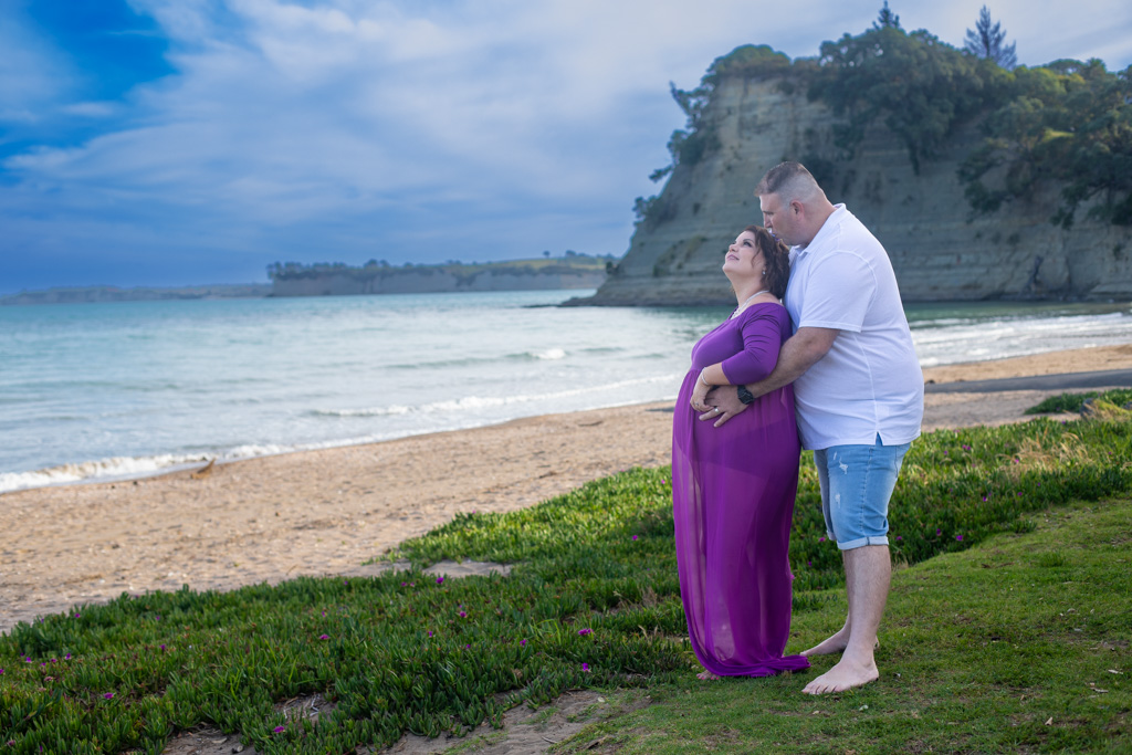 Auckland maternity photographer — beach in purple gown