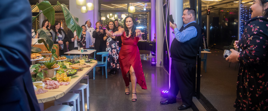 Auckland events photographer — woman dancing at celebration