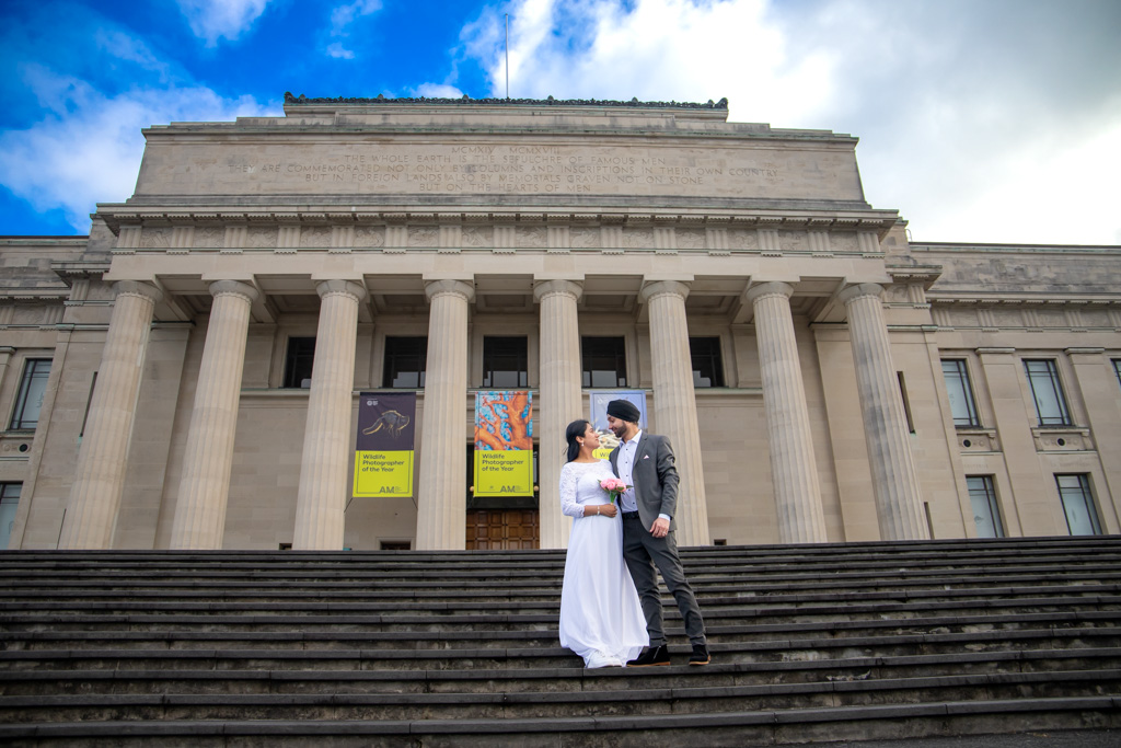 Auckland wedding photographer — couple on Auckland Museum steps