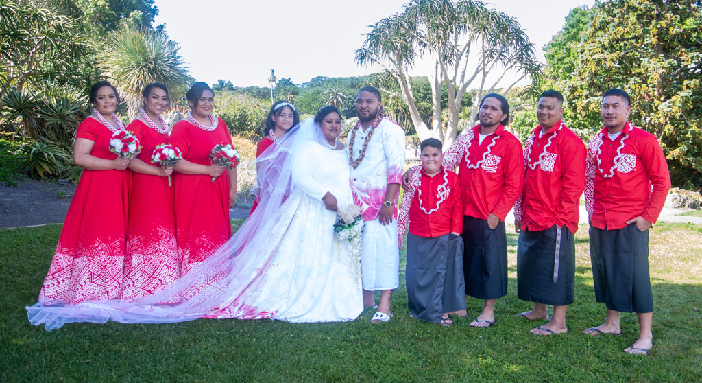 Auckland wedding photographer — Pacific wedding party in red and white