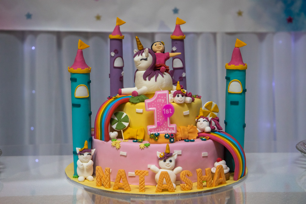 Auckland events photographer — first birthday unicorn castle cake