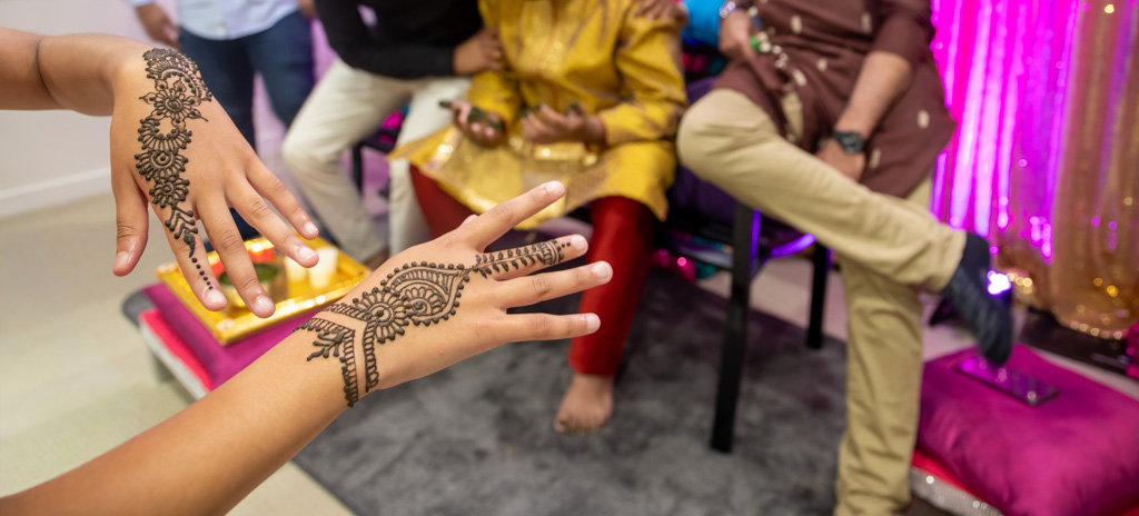 Auckland events photographer — henna mehndi hands at ceremony